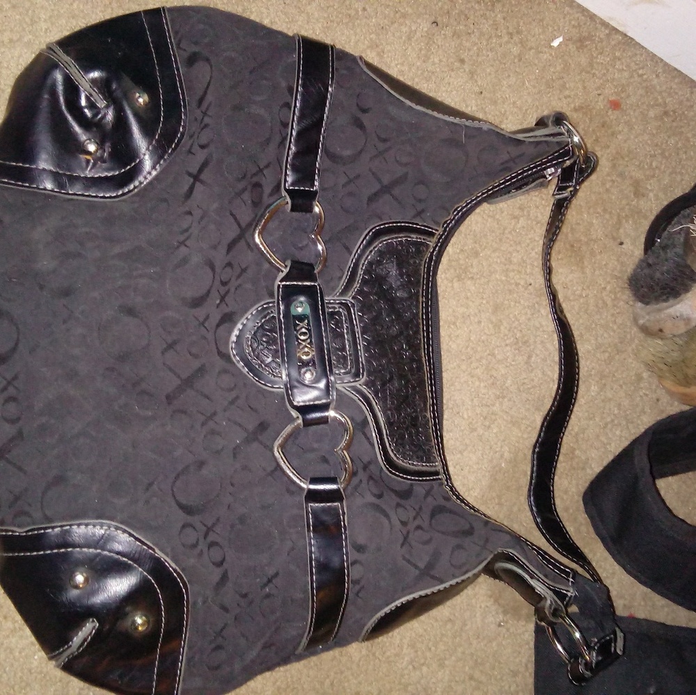 A xoxo black purse